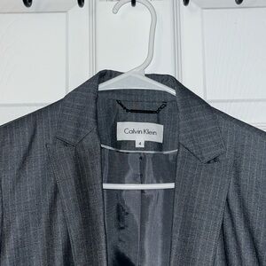 Calvin Klein, size 4 women’s pantsuit.slightly used worn a few times.